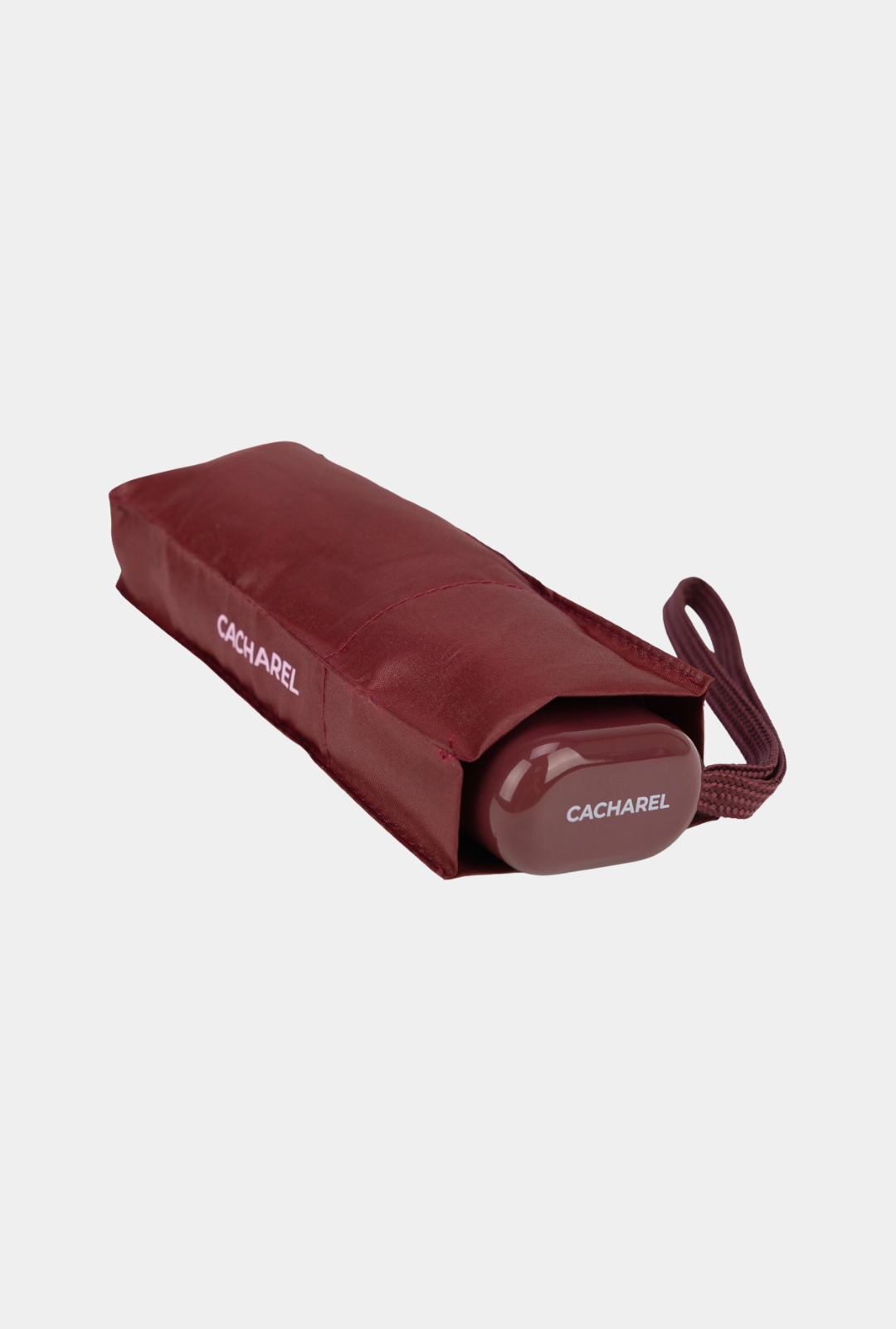 Paraguas plegable Cacharel con protección solar UPF 50+ color burdeos con funda